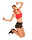 Attractive sporty woman jumps islated over white background Royalty Free Stock Photo