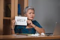 Attractive stressed and overworked Asian woman working at office laptop computer desk in stress feeling frustrated and helpless Royalty Free Stock Photo