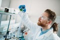 Attractive student of chemistry working in laboratory Royalty Free Stock Photo