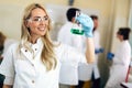 Attractive student of chemistry working in laboratory Royalty Free Stock Photo