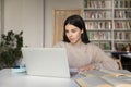 Attractive girl use laptop preparing for university exams