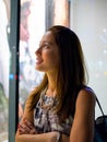 Attractive, stylish, fashionable young asian woman window shopping