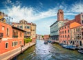Attractive summer cityscape of Vennice with famous water canal and colorful houses. Splendid morning scene of Italy, Europe. Nice
