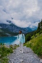 Attractive summer morning on the unique Oeschinensee Lake. Wonderful outdoor scene in the Swiss Alps with Bluemlisalp Royalty Free Stock Photo