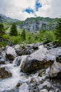 Attractive summer morning on the unique Oeschinensee Lake. Wonderful outdoor scene in the Swiss Alps with Bluemlisalp Royalty Free Stock Photo