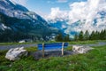 Attractive summer morning on the unique Oeschinensee Lake. Wonderful outdoor scene in the Swiss Alps with Bluemlisalp Royalty Free Stock Photo
