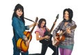 Attractive three women with guitars Royalty Free Stock Photo