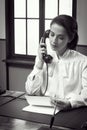 Attractive vintage secretary on the phone Royalty Free Stock Photo