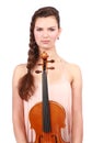 Attractive violinist posing with violin