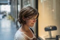 Attractive white woman posing in an historic shopping mall Royalty Free Stock Photo