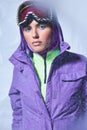 attractive woman in balaclava, purple winter