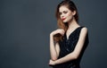 Attractive woman black dress glamor cosmetics luxury dark background Royalty Free Stock Photo