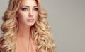 Attractive woman blonde with elegant hairstyle.