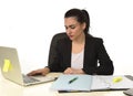 Attractive woman in business suit working tired and bored in office computer desk looking sad Royalty Free Stock Photo