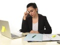 Attractive woman in business suit working tired and bored in office computer desk looking sad Royalty Free Stock Photo