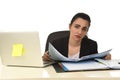 Attractive woman in business suit working tired and bored in office computer desk looking sad