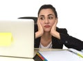 Attractive woman in business suit working tired and bored in office computer desk looking sad