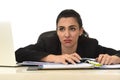 Attractive woman in business suit working tired and bored in office computer desk looking sad Royalty Free Stock Photo