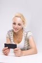 An attractive woman checking her cell phone Royalty Free Stock Photo