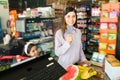 Attractive woman at the checkout counter Royalty Free Stock Photo