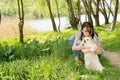 Attractive woman cuddling her tiny dog Royalty Free Stock Photo