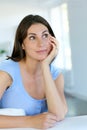 Attractive woman daydreaming Royalty Free Stock Photo