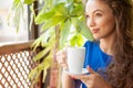 Attractive woman drinking coffe in a coffee shop Royalty Free Stock Photo