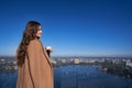 Attractive woman drinking morning coffee on balcony Royalty Free Stock Photo