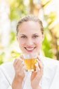 Attractive woman drinking tea Royalty Free Stock Photo