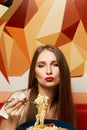 Attractive woman eating seafood pasta Royalty Free Stock Photo
