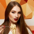 Attractive woman eating seafood pasta Royalty Free Stock Photo