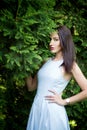 Attractive woman, fashion model in green garden. Outdoor Royalty Free Stock Photo