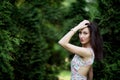 Attractive woman, fashion model in green garden. Outdoor Royalty Free Stock Photo