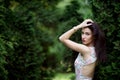 Attractive woman, fashion model in green garden. Outdoor Royalty Free Stock Photo