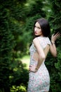 Attractive woman, fashion model in green garden. Outdoor Royalty Free Stock Photo