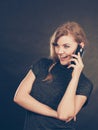 Attractive woman flirting texting on mobile phone. Royalty Free Stock Photo