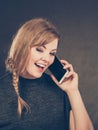 Attractive woman flirting texting on mobile phone. Royalty Free Stock Photo