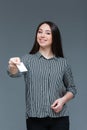 Attractive woman giving blank card at camera Royalty Free Stock Photo