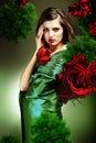 Attractive woman in green fabric Royalty Free Stock Photo