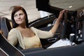 Attractive woman having a test drive