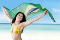 Attractive woman holding Brazil flag Royalty Free Stock Photo