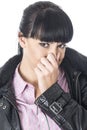 Attractive Woman Holding Her Nose to Stop a Bad Smell or Aroma Royalty Free Stock Photo