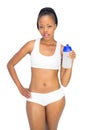 Attractive woman holding sports bottle