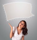 Attractive woman looking abstract speech bubble copy space