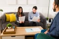 Attractive woman and man reading the divorce papers Royalty Free Stock Photo