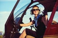 Attractive woman pilot sitting Royalty Free Stock Photo