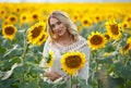 Attractive woman portrait in a sunflowers