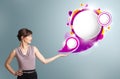 Attractive woman presenting abstract speech bubble copy space