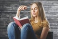 Attractive woman reading book Royalty Free Stock Photo