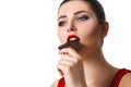 Attractive woman with red lipstick eats chocolate Royalty Free Stock Photo